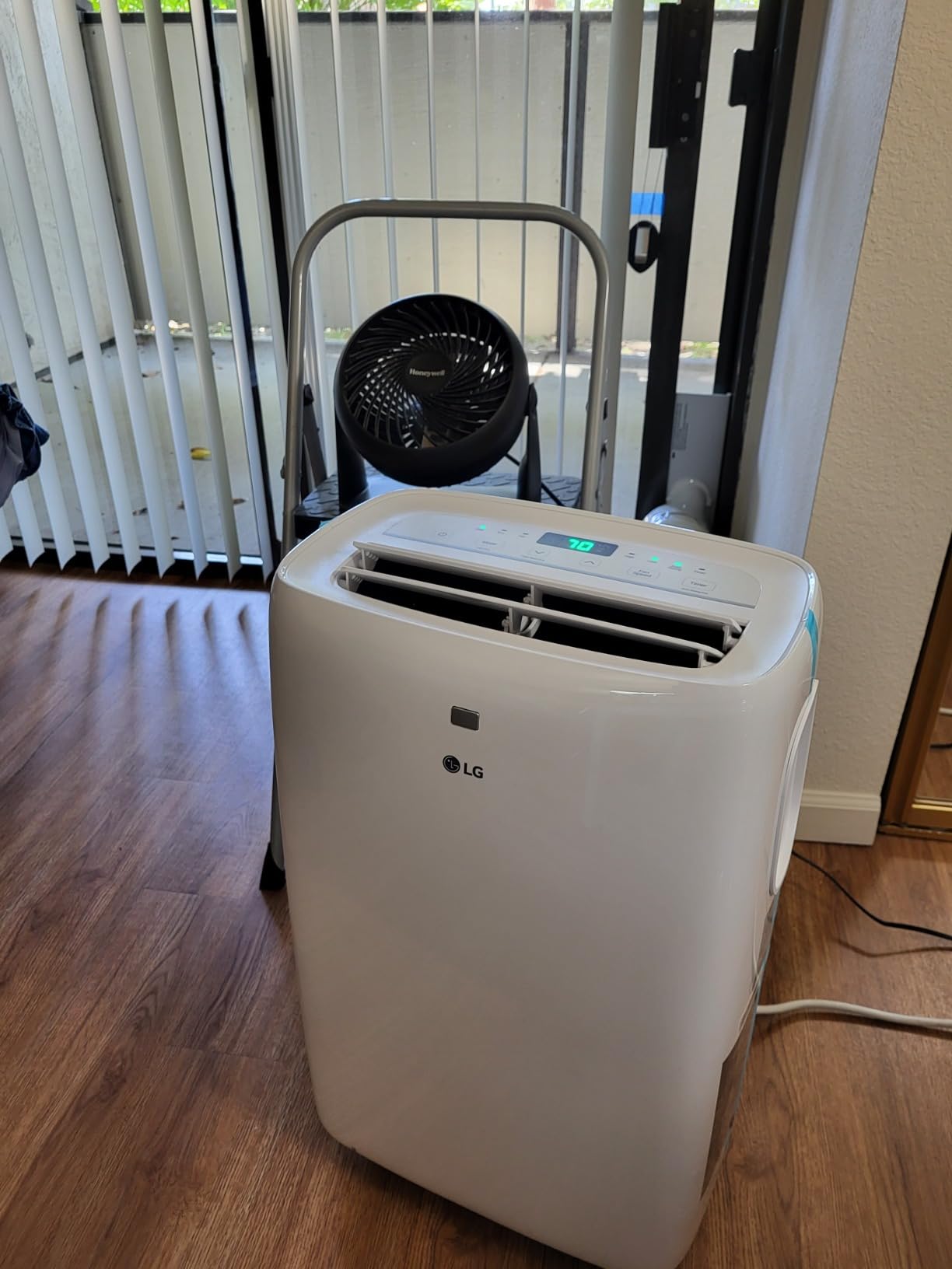 LG 7,000 BTU (DOE) 10,000 BTU (ASHRAE) Portable Air Conditioner, 115V, Cools 300 Sq.Ft. (12' x 25' Room Size), Quiet Operation, LCD Remote Control, and Window Installation Kit, White customer photo 1