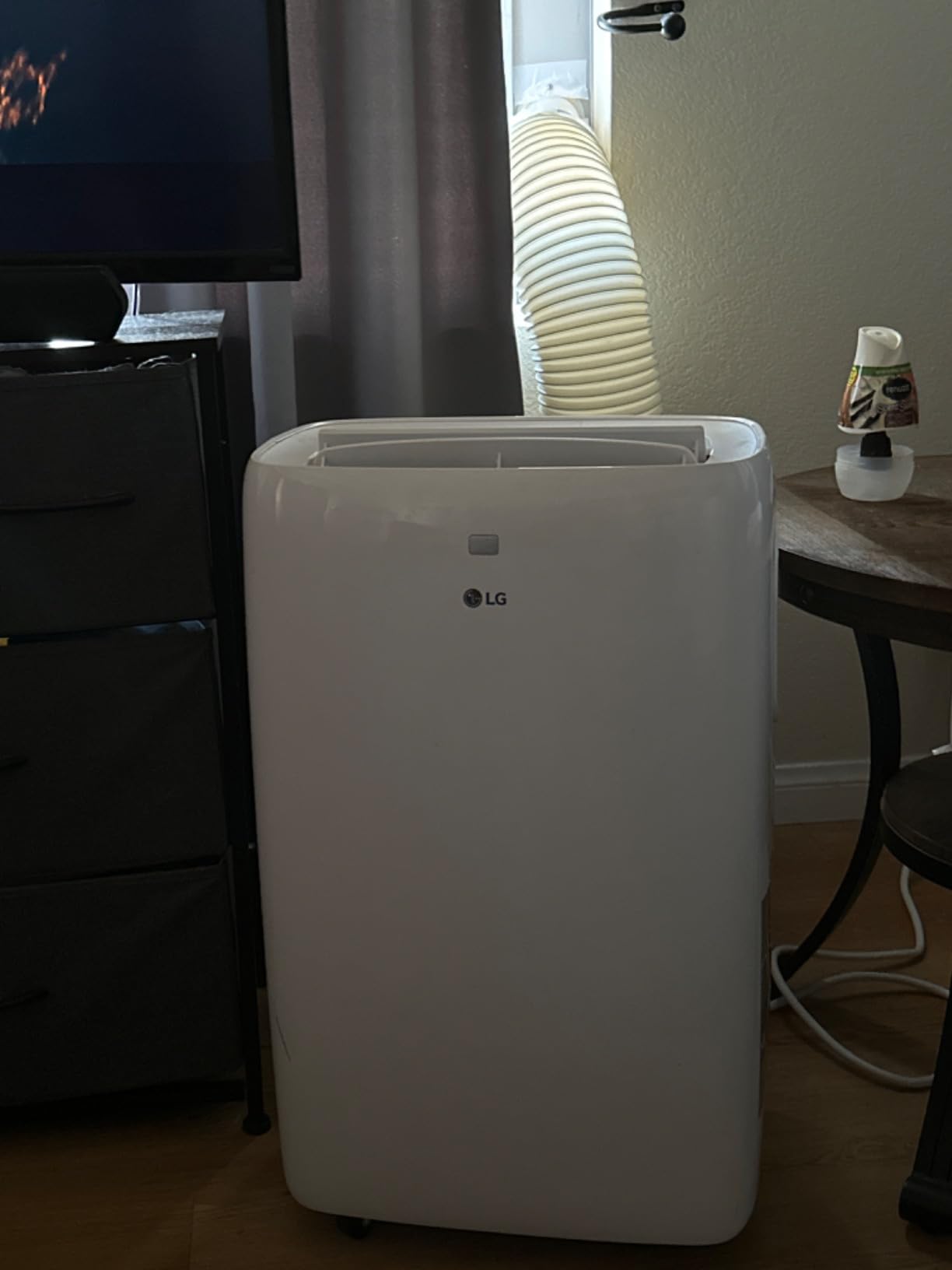 LG 7,000 BTU (DOE) 10,000 BTU (ASHRAE) Portable Air Conditioner, 115V, Cools 300 Sq.Ft. (12' x 25' Room Size), Quiet Operation, LCD Remote Control, and Window Installation Kit, White customer photo 2
