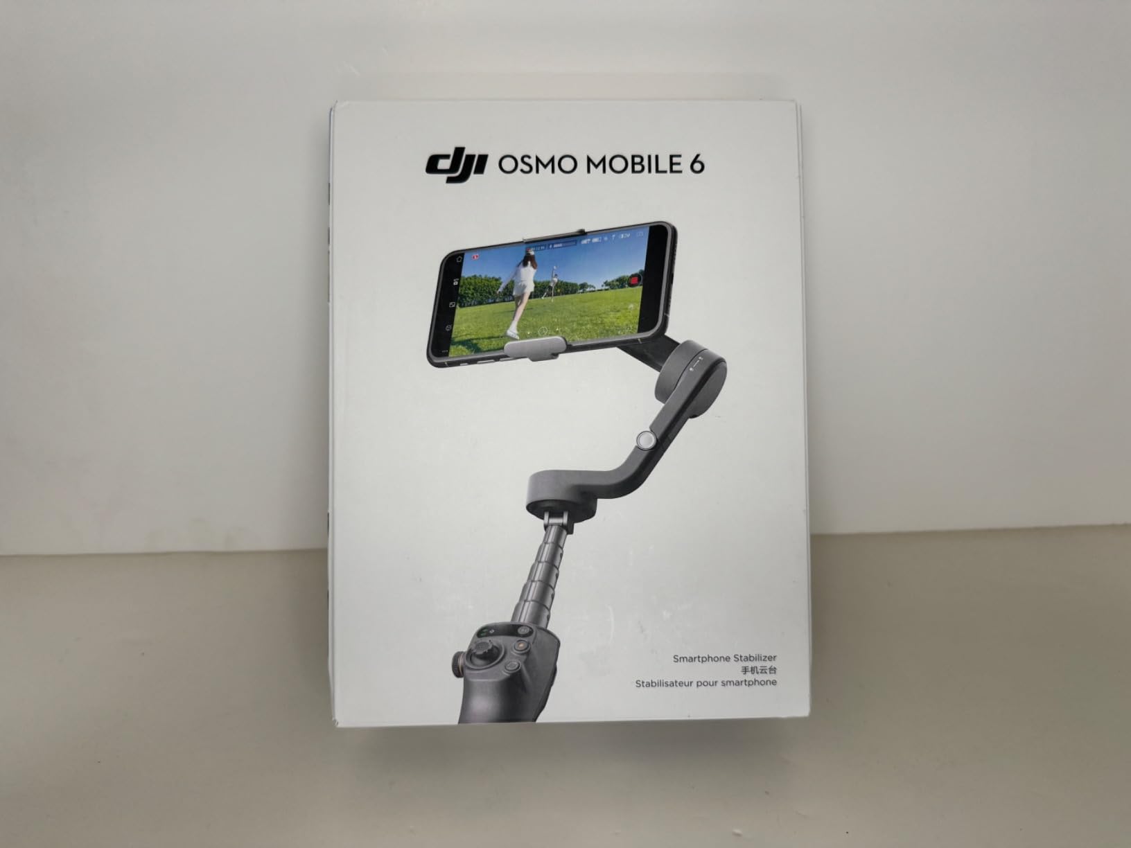 Osmo Mobile 6 Gimbal Stabilizer for Smartphones, 3-Axis Phone Gimbal, Built-In Extension Rod, Object Tracking, Portable and Foldable, Vlogging Stabilizer, YouTube TikTok, Slate Gray customer photo 1