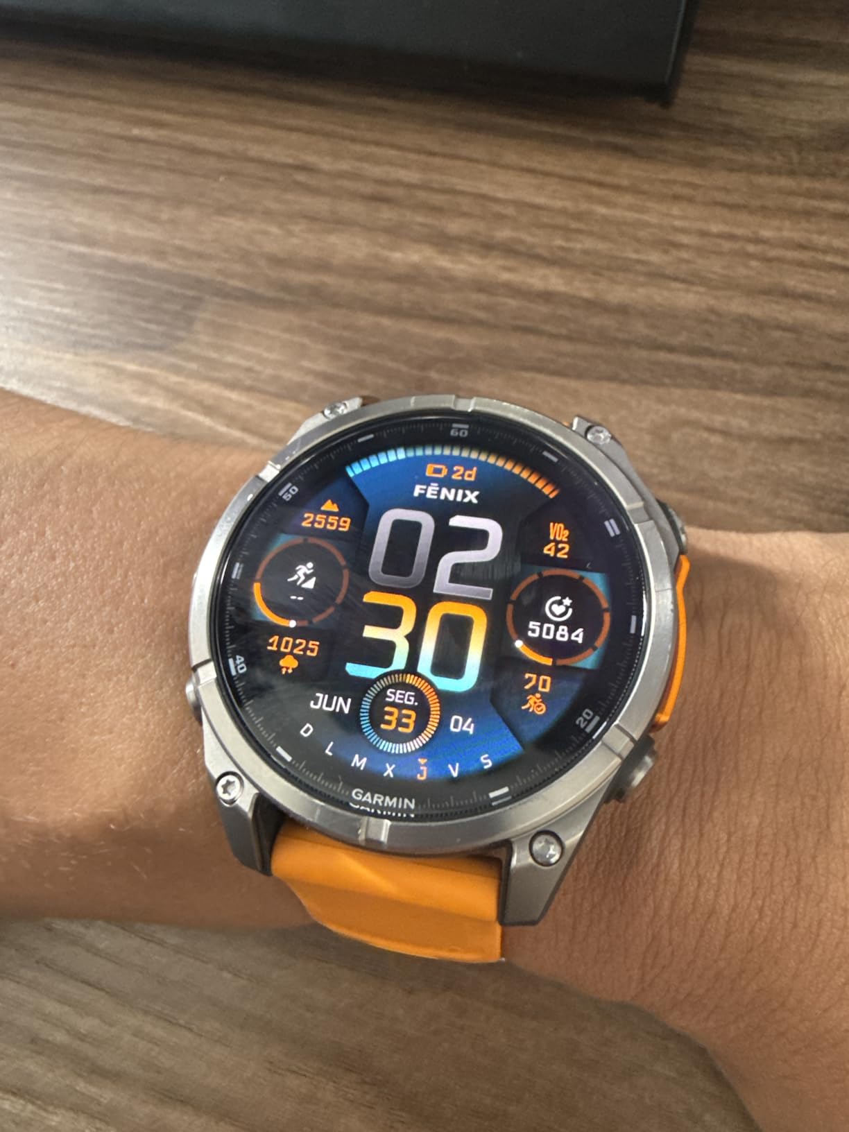 fēnix® 8 - 47 mm, AMOLED, Sapphire, Premium Multisport GPS Smartwatch, Long-Lasting Battery Life, Dive-Rated, Built-in LED Flashlight, Titanium with Spark Orange/Graphite Band customer photo 1