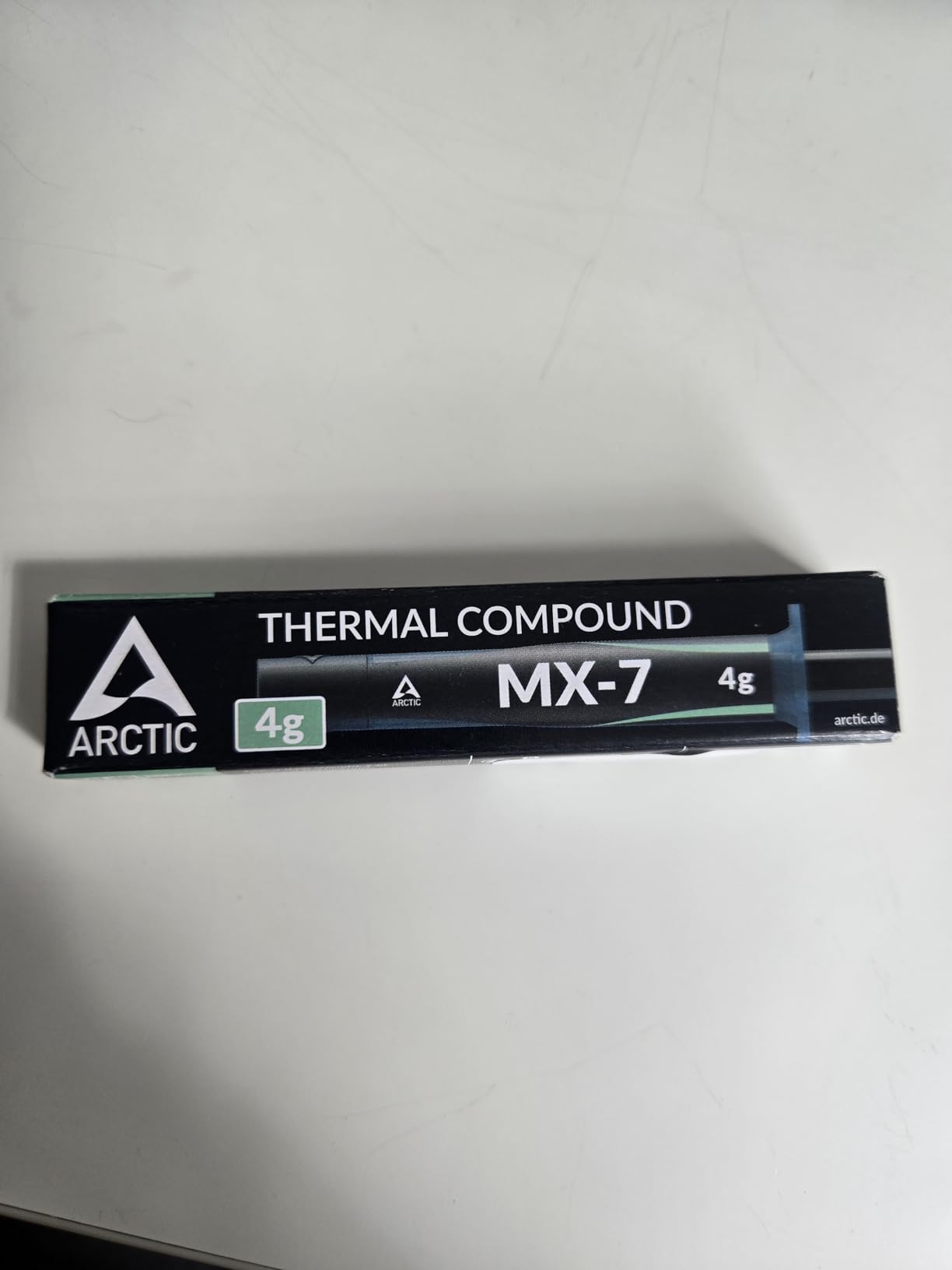 ARCTIC MX-7 (4 g) - Ultimate Performance Thermal Paste for CPUs, Consoles, Graphics Cards, Laptops, Processors, Very High Thermal Conductivity, Long Durability, Non-Conductive, Non-Capacitive customer photo 1