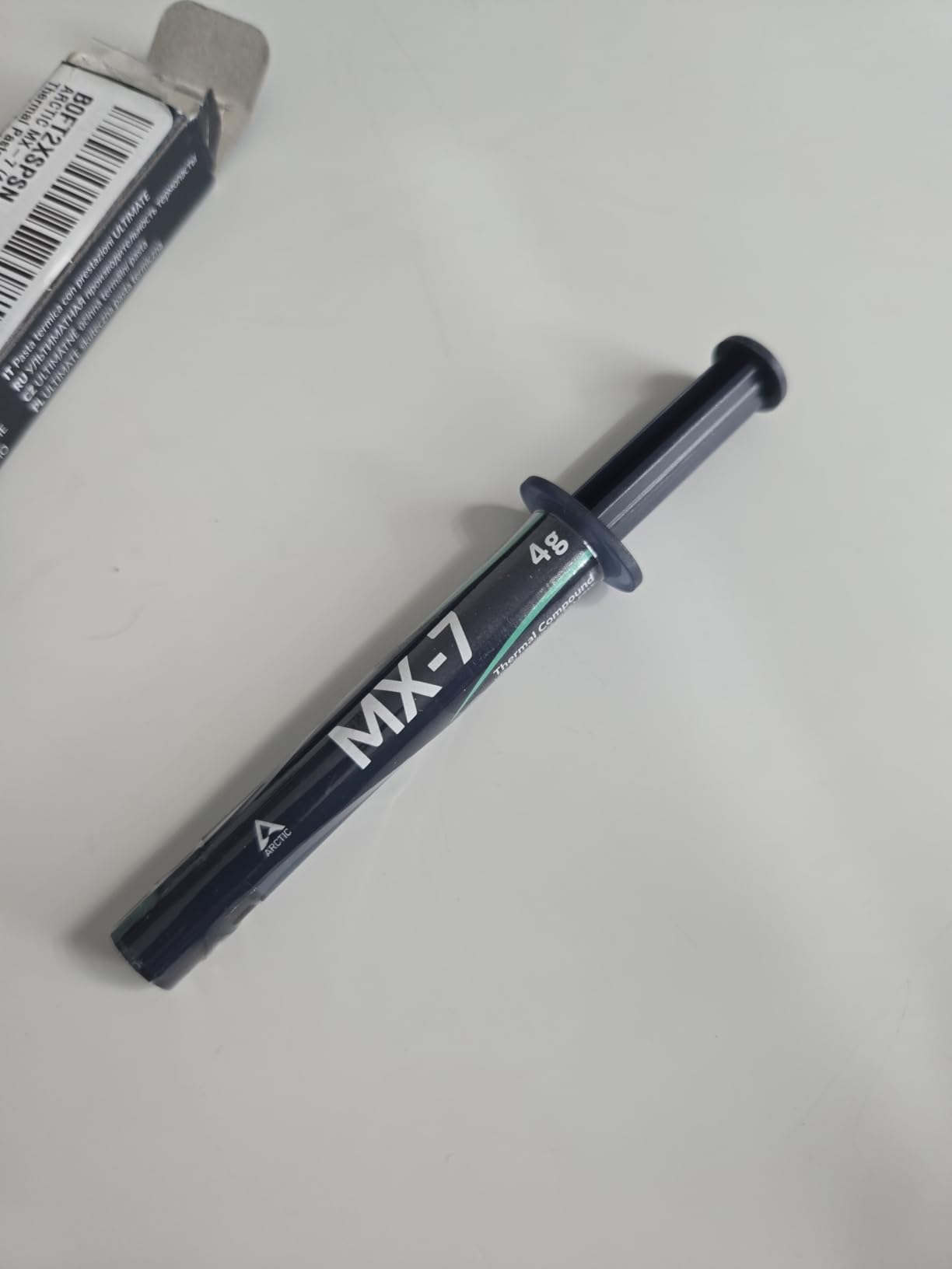 ARCTIC MX-7 (4 g) - Ultimate Performance Thermal Paste for CPUs, Consoles, Graphics Cards, Laptops, Processors, Very High Thermal Conductivity, Long Durability, Non-Conductive, Non-Capacitive customer photo 2