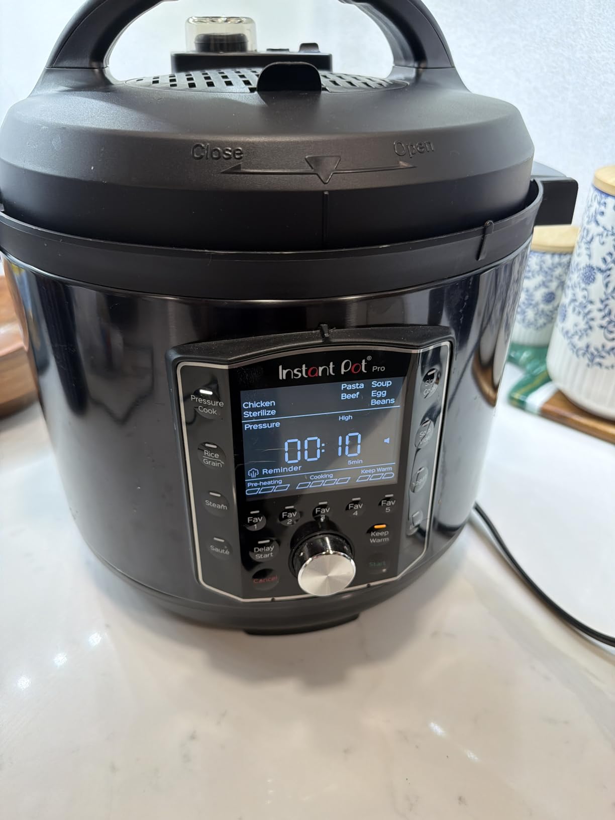 Pro (8 QT) 10-in-1 Pressure Cooker, Slow Cooker, Rice/Grain Cooker, Steamer, Saute, Sous Vide, Yogurt Maker, Sterilizer, and Warmer, Includes App with Over 800 Recipes, Black customer photo 1