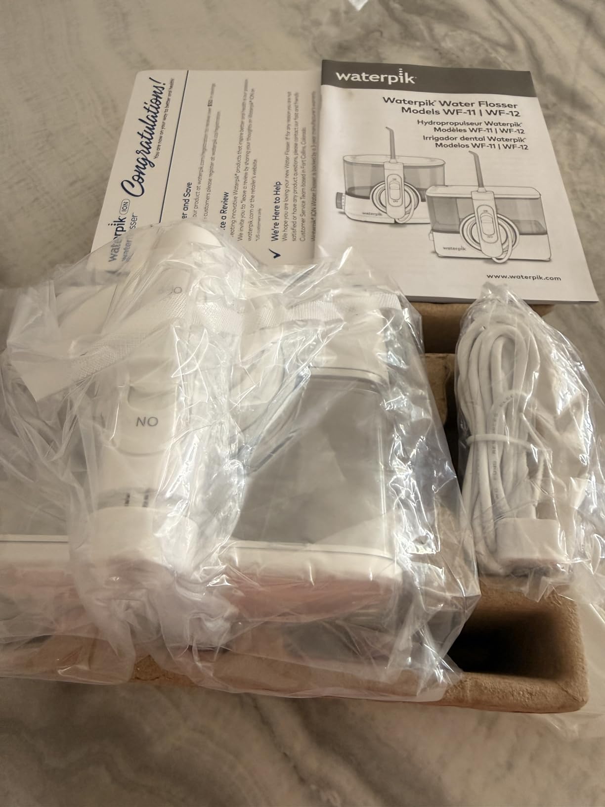 Waterpik ION Professional Water Flosser, Rechargeable and Portable for Teeth, Gums, Braces, 10 Settings, 7 Flossing Tips For Multiple Users And Needs, ADA Accepted, WF-12 White, Packaging May Vary customer photo 2