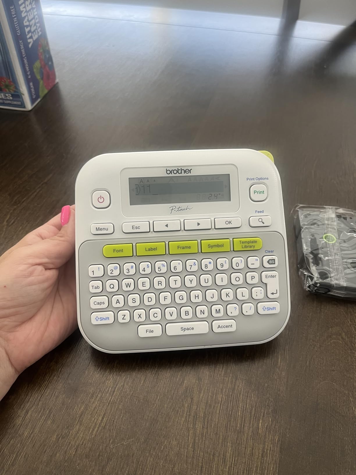 Brother P-Touch, PTD210, Easy-to-Use Label Maker Bundle (4 Label Tapes Included), White, Small customer photo 1