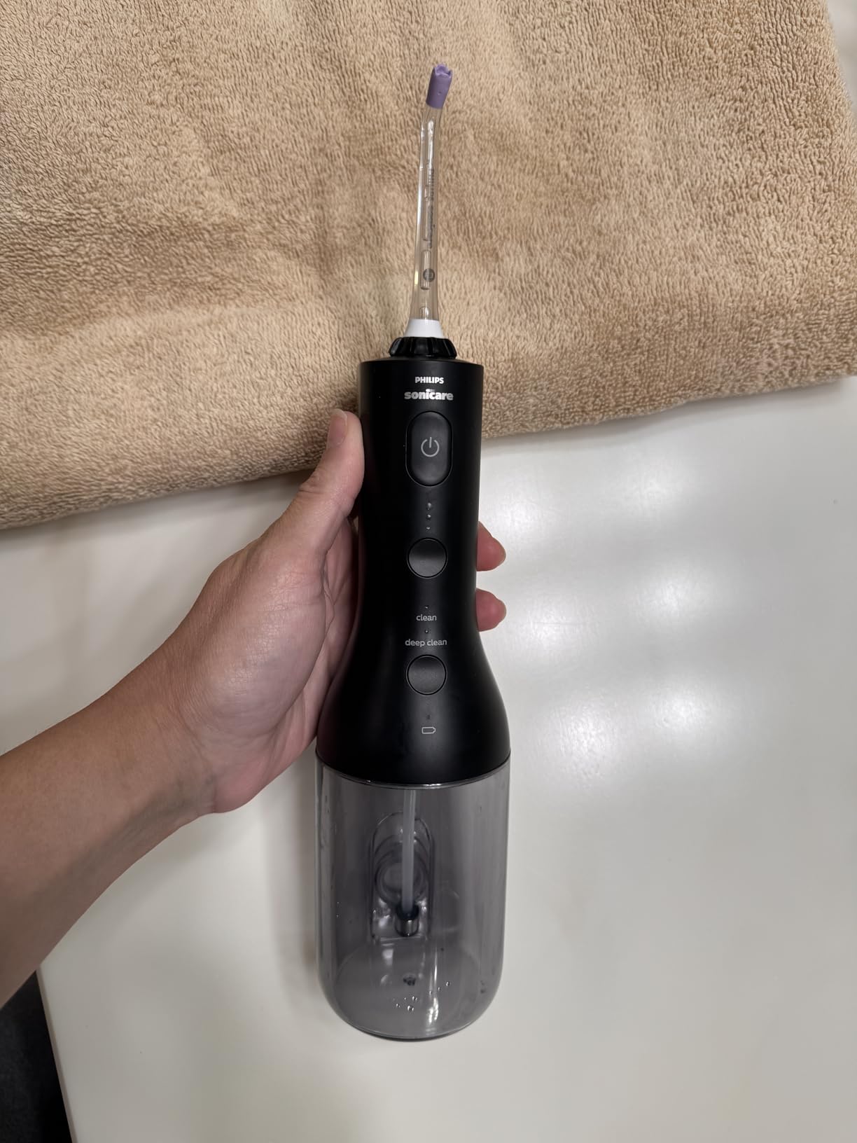 Philips Sonicare Cordless Power Flosser 3000 - Water Flosser with Innovative Quad Stream Technology, Oral Irrigator with 2 Flossing Modes and 3 Pressure Levels, IPX7 Waterproof, Black, HX3826/23 customer photo 2