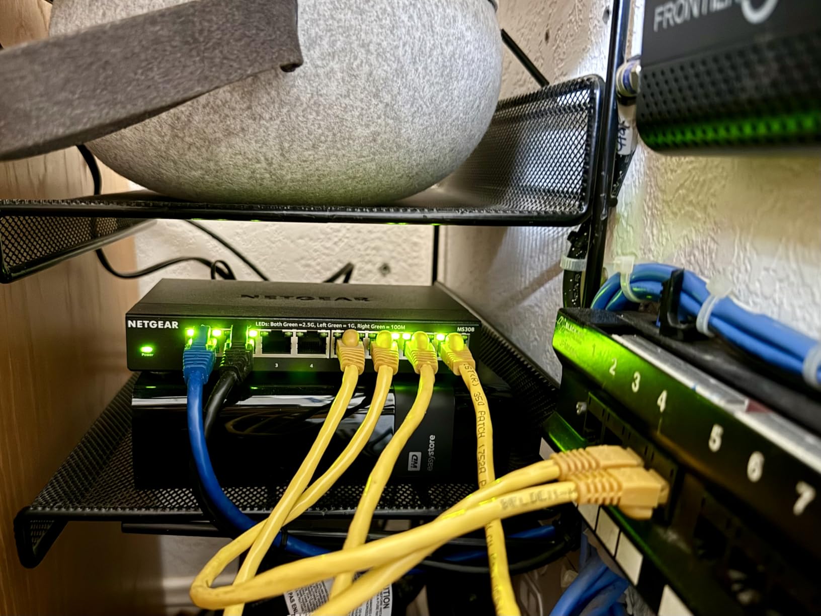 NETGEAR 8-Port 2.5G Multi-Gigabit Ethernet Unmanaged Network Switch (MS308) | With 8 x 2.5Gbps Ports, Desktop or Wall Mount, Metal Case customer photo 1