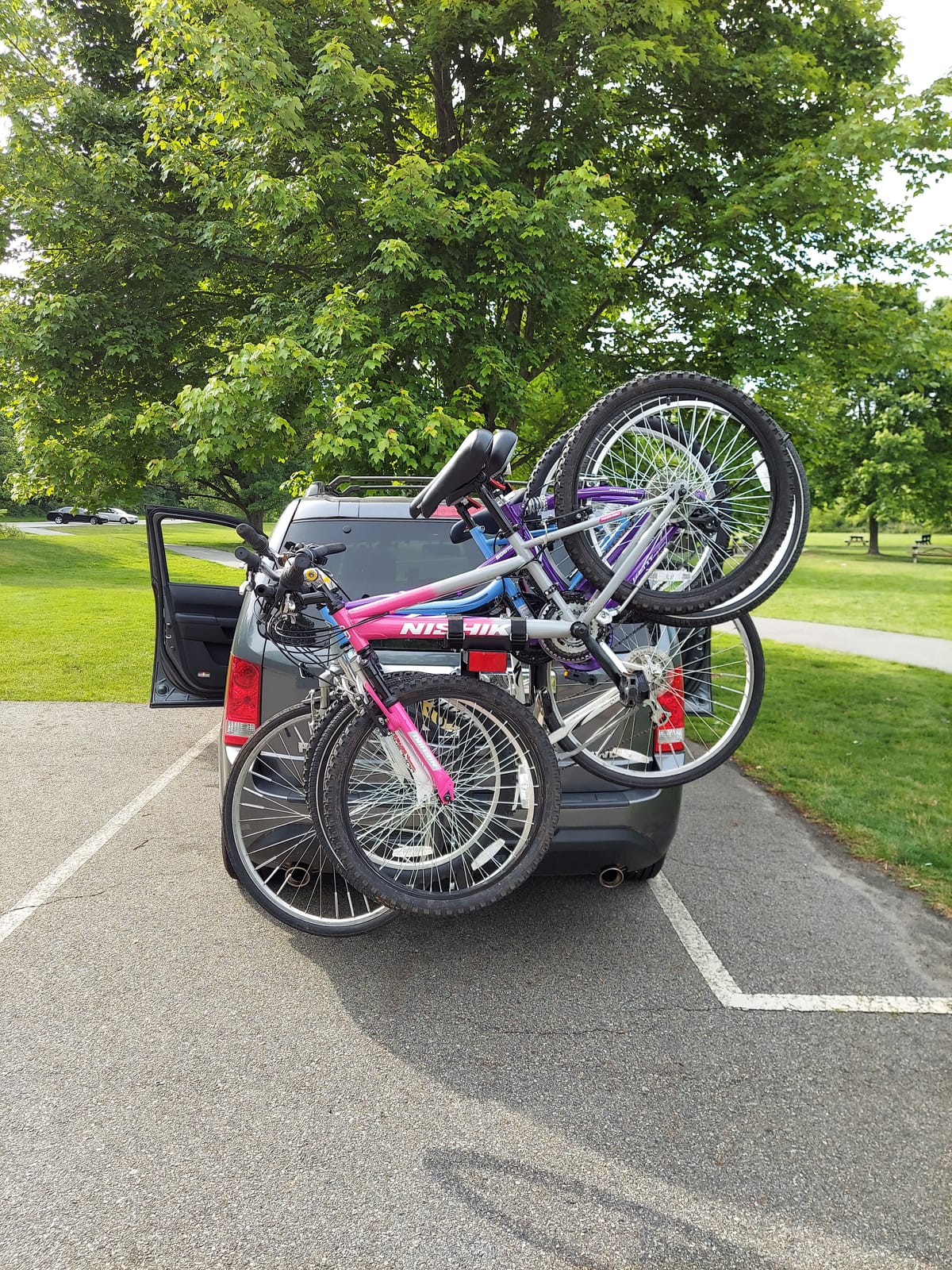 MaxxHaul Hitch Mount 4 Bike Rack 150 lb Capacity Heavy‑Duty Swing Down Design Fits Cars Trucks SUVs and Minivans with Safety Reflector Easy Install (70210) customer photo 2