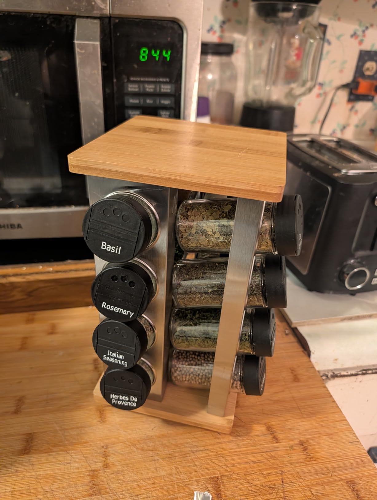 Kamenstein 16 Jar Warner Revolving Countertop Spice Rack Organizer with Lift & Pour Caps and Spices Included, FREE Spice Refills for 5 years, Stainless Steel & Bamboo with Black Caps customer photo 2
