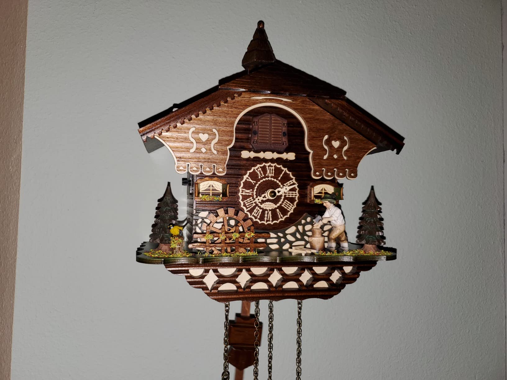 Trenkle Quartz Cuckoo Clock Black Forest House with Moving Wood Chopper and Mill Wheel, with Music TU 4217 QM customer photo 2