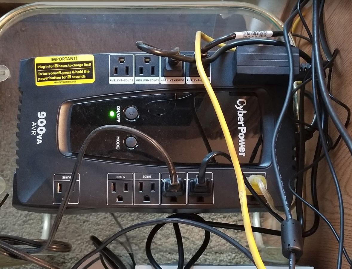 CyberPower AVRG900LCD Intelligent LCD UPS Battery Backup | 900VA/480W, 12 Outlets, AVR, Compact customer photo 1