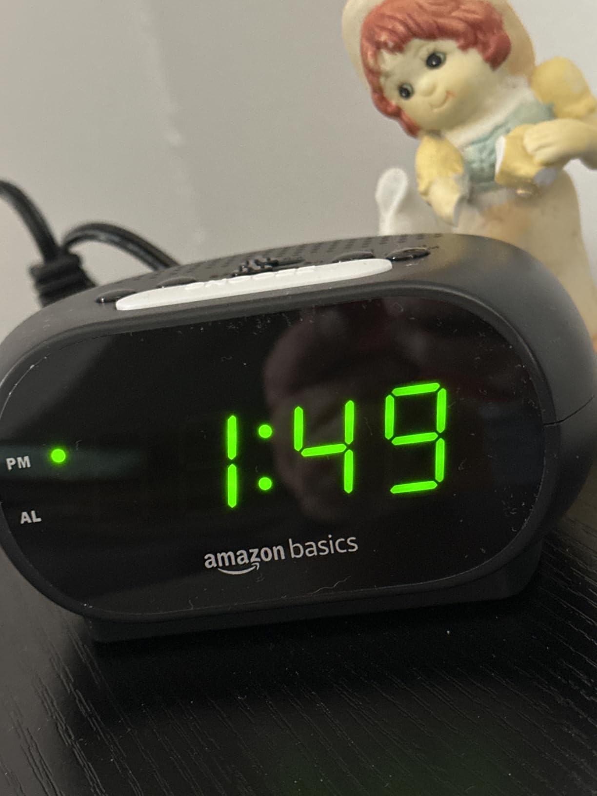 Amazon Basics Small Digital Oval Alarm Clock with LED Display, Nightlight, Snooze Function & Battery Backup, Black, 4.5 x 3.5 x 2.4 Inches customer photo 2