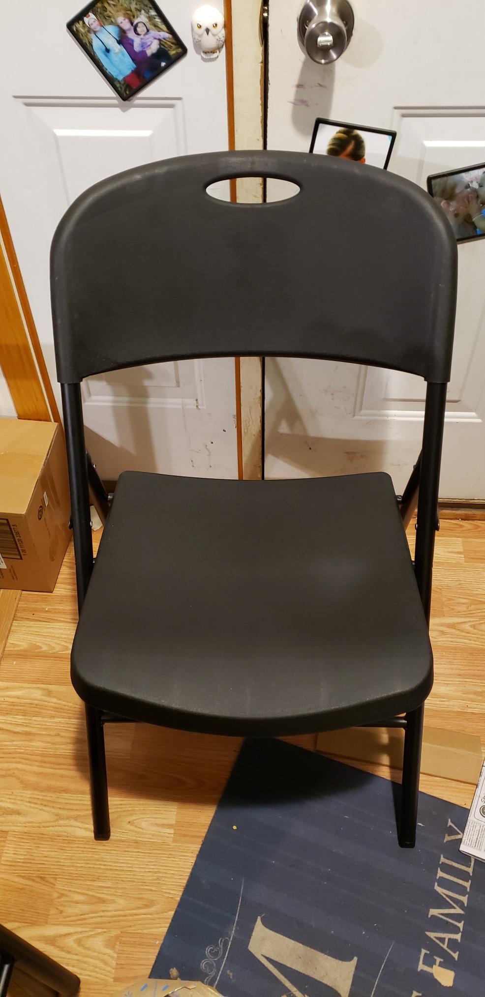 Amazon Basics Sturdy Foldable Portable Plastic Chair, 350-Pound Capacity, Supportive Seating for Events, Space-Saving, Black, 6-Pack customer photo 1