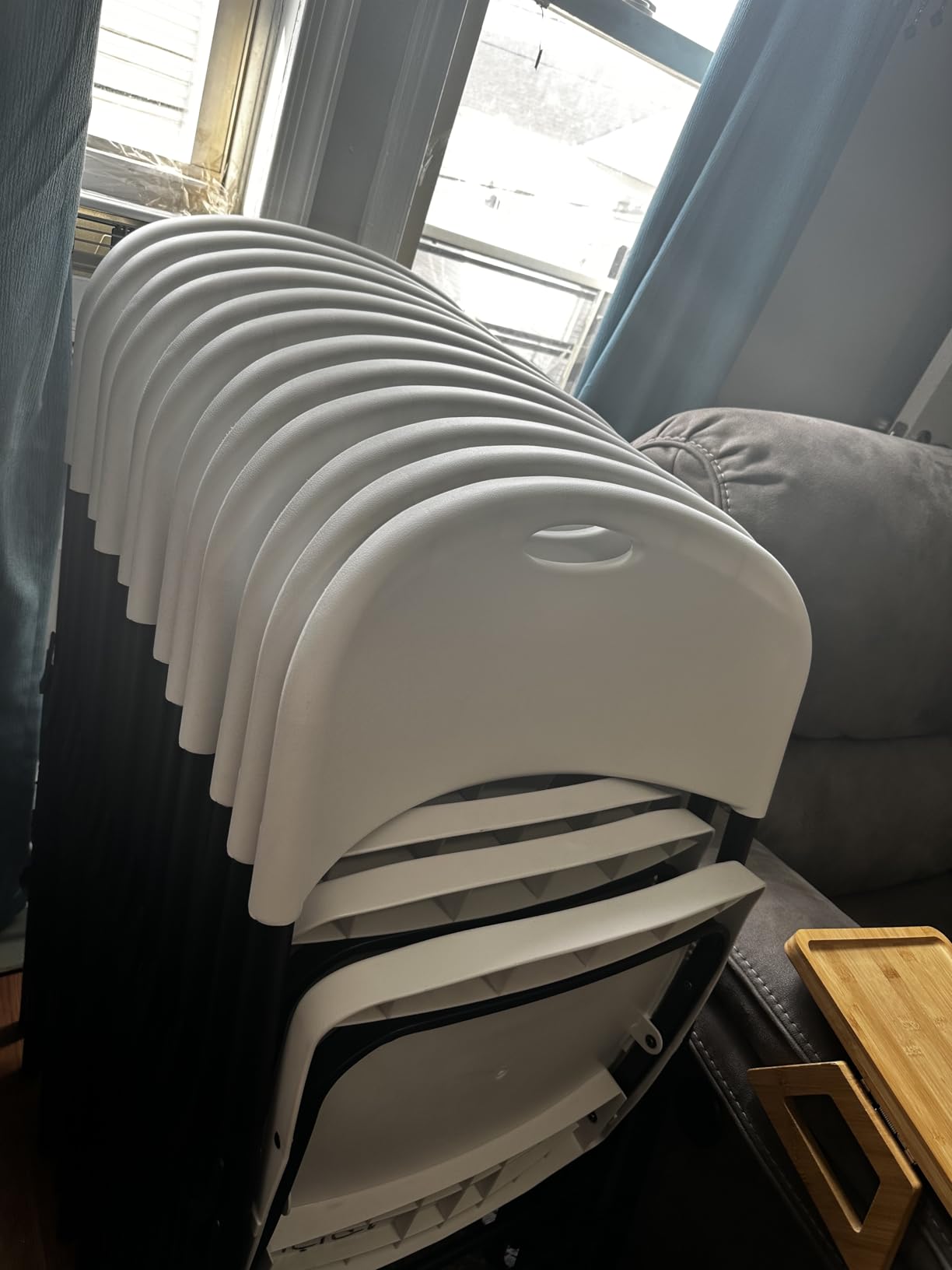 Amazon Basics Sturdy Foldable Portable Plastic Chair, 350-Pound Capacity, Supportive Seating for Events, Space-Saving, Black, 6-Pack customer photo 2