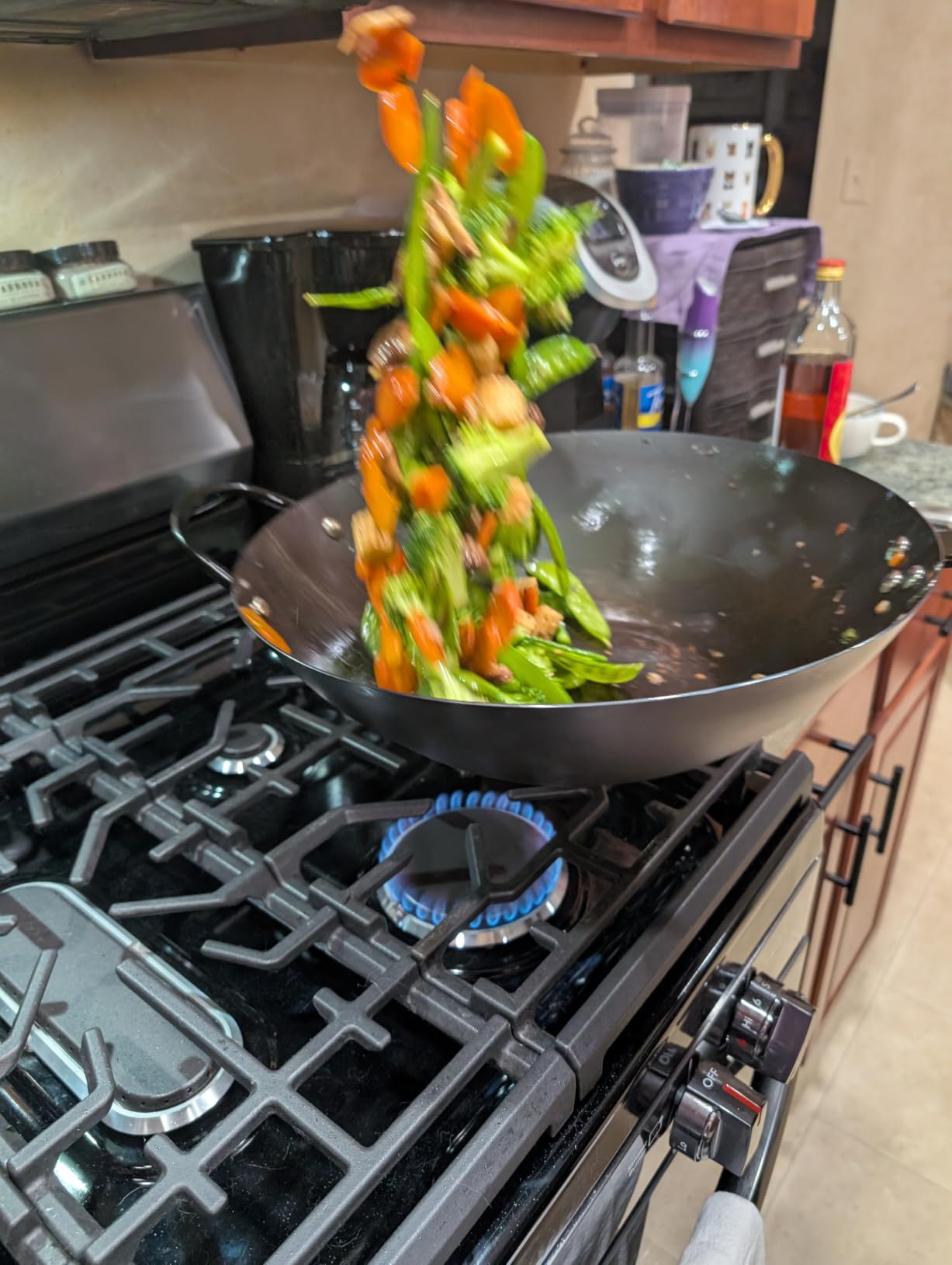 Babish Carbon Steel Wok 14 Inch Flat Bottom Stir Fry Pan Durable Heavy Duty Cookware for High Heat Cooking Stir Fry Sautéing Frying Compatible with Gas Electric and Induction Stovetops customer photo 2