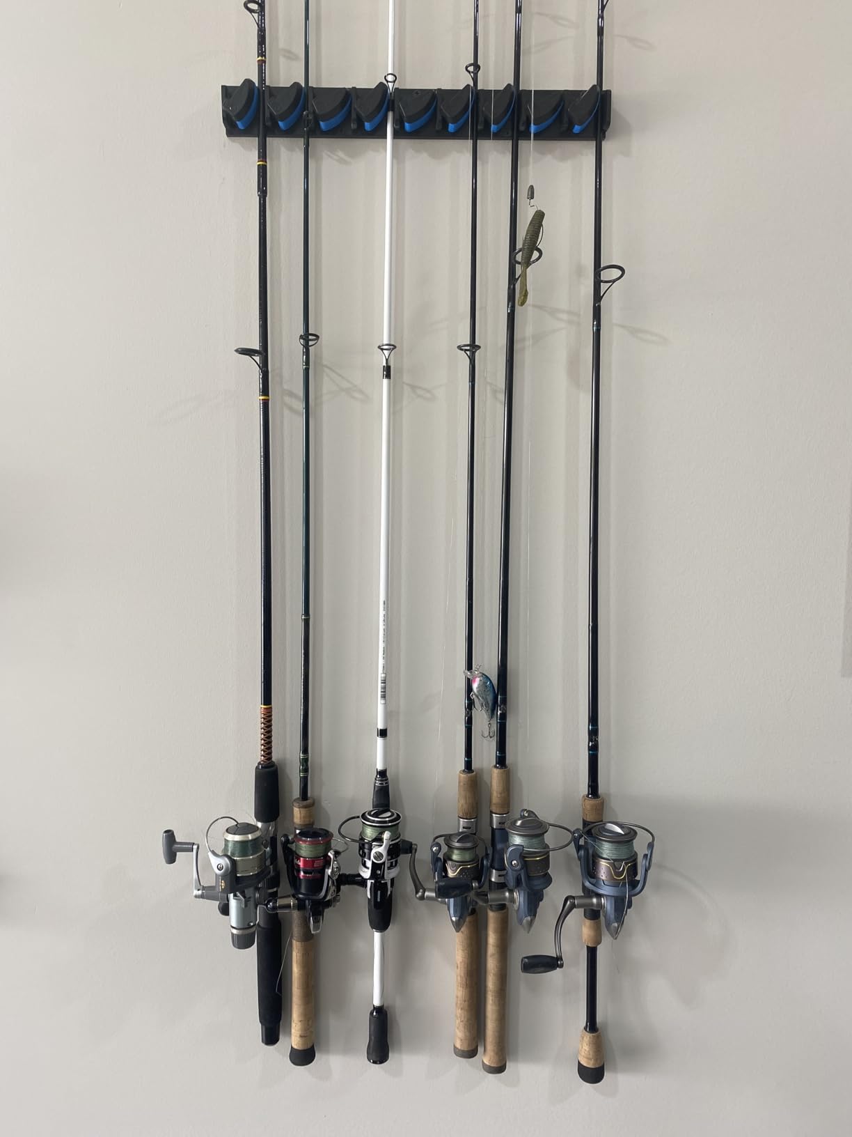 PLUSINNO V9 Vertical Fishing Rod Holder, Wall Mounted Fishing Rod Rack, Fishing Pole Holder Holds Up to 9 Rods or Combos, Fishing Rod Holders for Garage,Fishing Gear and fishing Gifts for Men customer photo 1