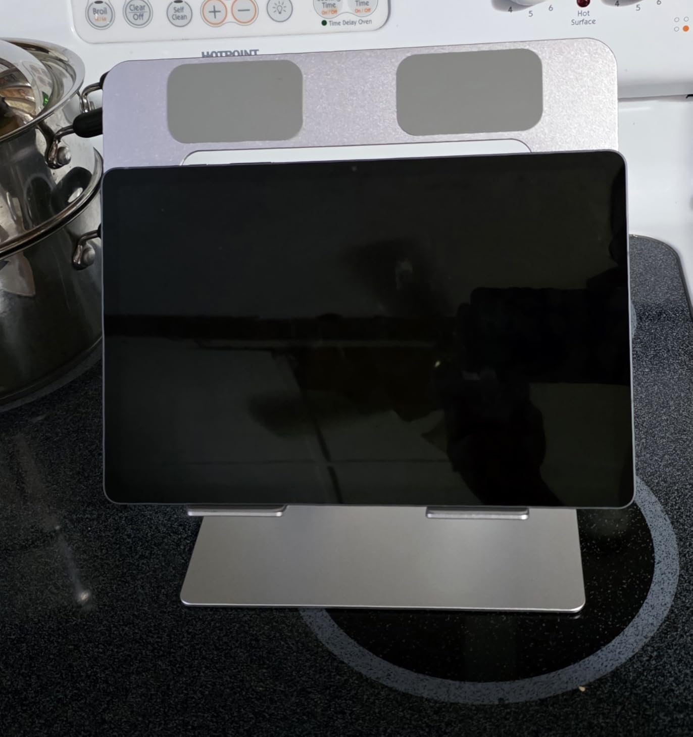 Amazon Basics Sturdy and Portable Ergonomic Laptop Stand for Desk, Height Adjustable Riser with Ventilated Cooling, Foldable, Fits all Laptops up to 15.6 Inch, Silver customer photo 2
