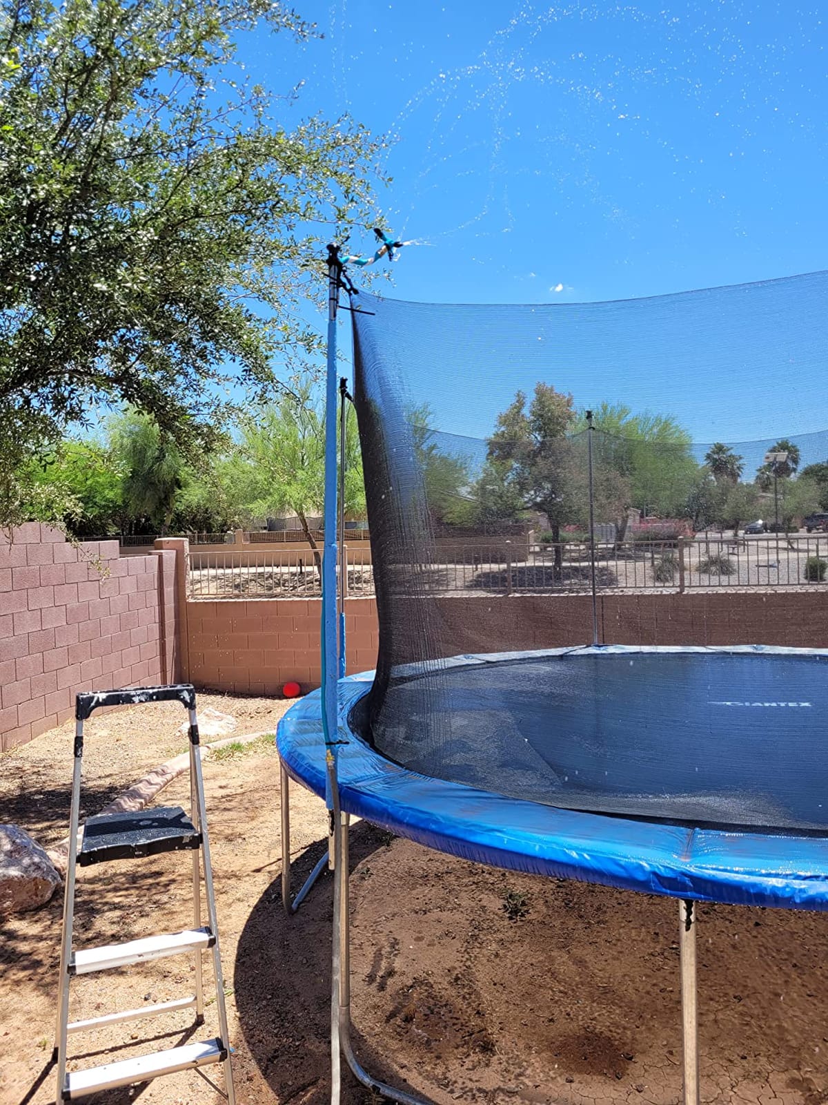 Trampoline Sprinkler - Net Friendly 360 Rotating Water Sprinkler for Kids, 5 Minutes Quick Setup Accessories for 10-16ft Trampolines, Blue customer photo 2