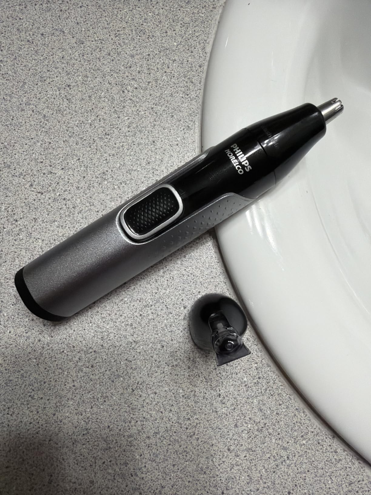 Norelco Philips Nose Trimmer 5000 for Nose, Ears, Eyebrows & Details | Protective Guard System, Dual-Sided Steel Blades, Eyebrow Combs, Rotary & Detail Trimmer, Washable, AA Battery, NT5600/62 customer photo 2