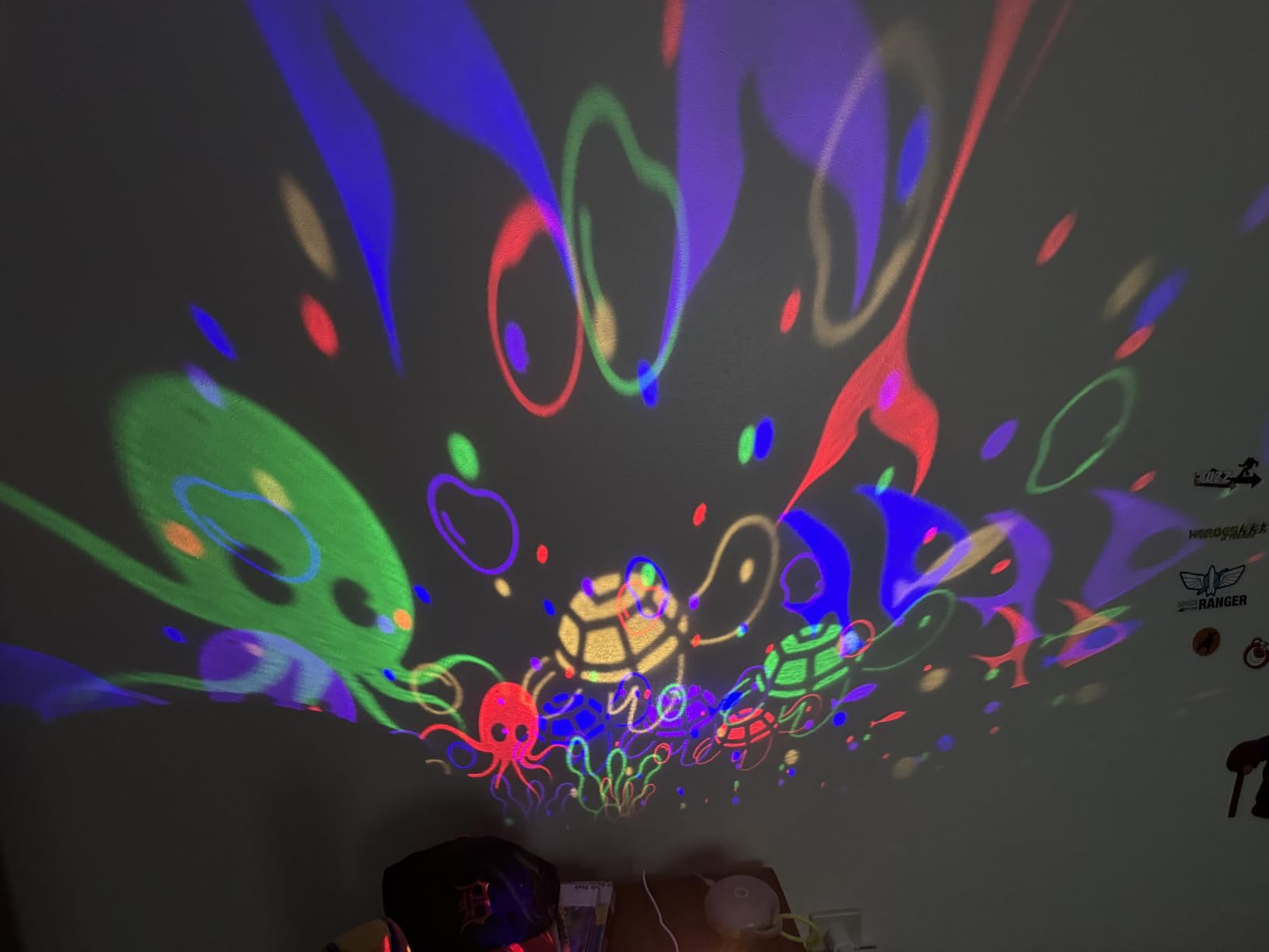 COOLNIGHT Boy Room Decor, 93 Lighting+3 Films Toddler Room Decor, Remote+Dimmable+360° Slient Nightlight for Baby Nursery, Starry Night Light Up Toys, Moon Projector (White) customer photo 1
