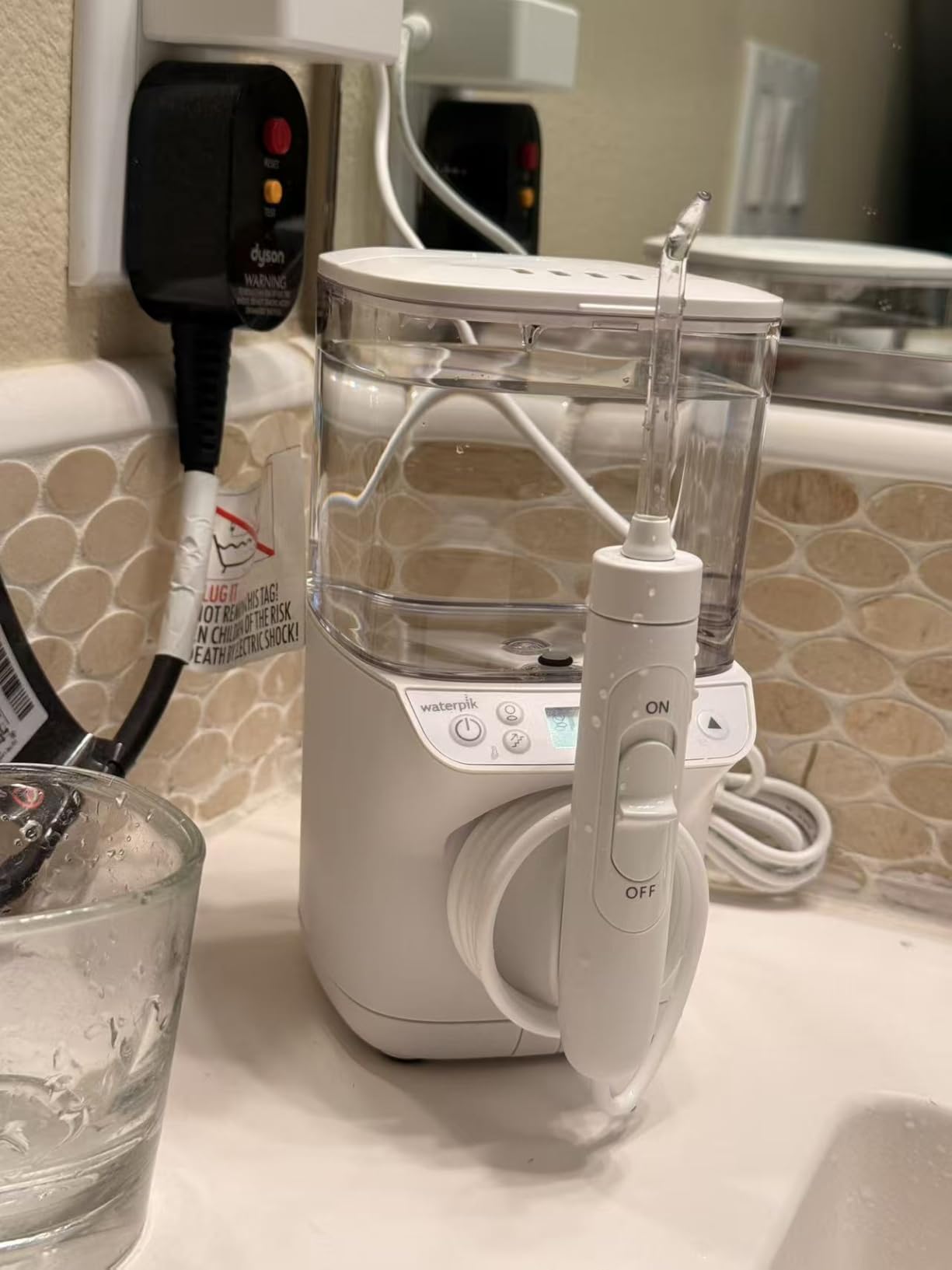 Waterpik Promax Countertop Water Flosser, SmartAdvance, 10 Settings, 5 Tips customer photo 1