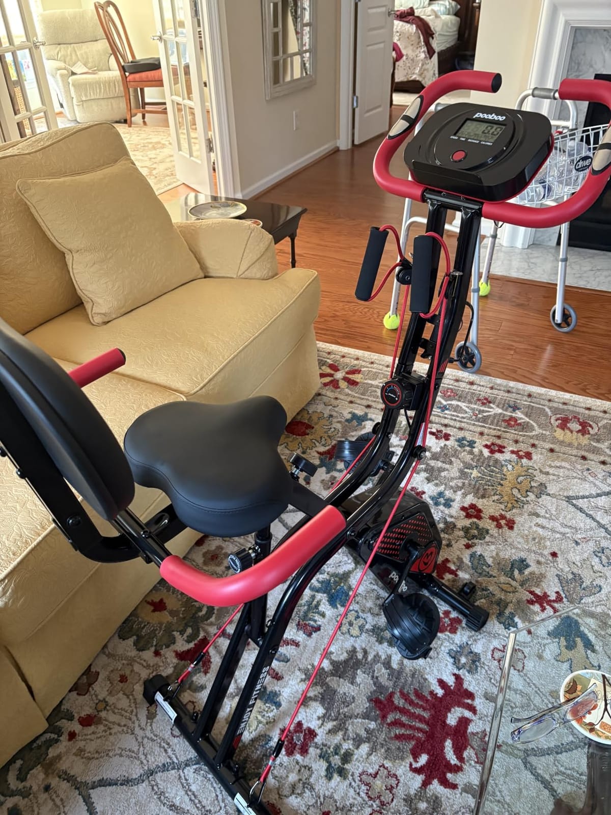 pooboo Folding Magnetic X‑Bike, Upright Exercise Bike for Home Gym | Foldable Indoor Stationary Cycling Bike, 8‑Level Resistance, 6.6 LBS Flywheel, 300 LB Capacity, Back Support Cushion customer photo 1
