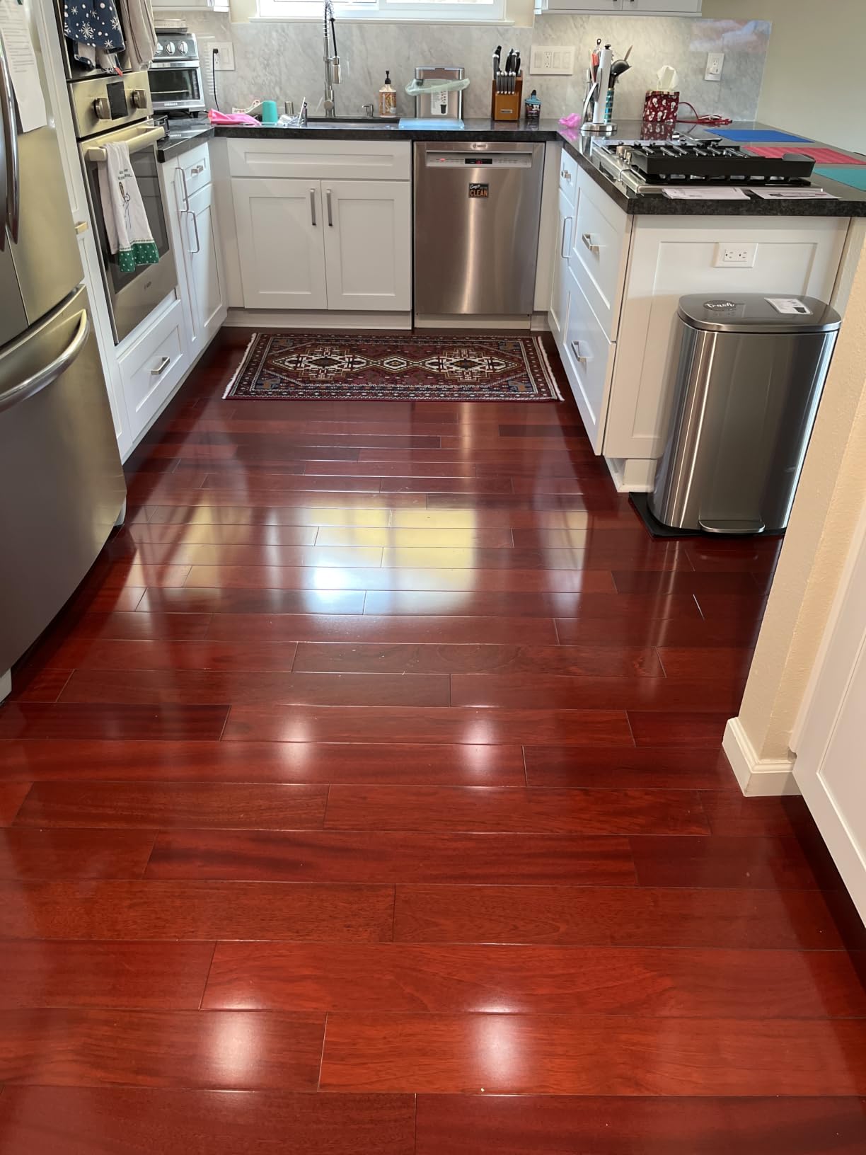 Amazon Basics Steam Mop for All Sealed Hard Floors, Heats Up in 30 Seconds, Chemical-Free Cleaning, 3 Washable Pads, 20-Foot Cord, White customer photo 1